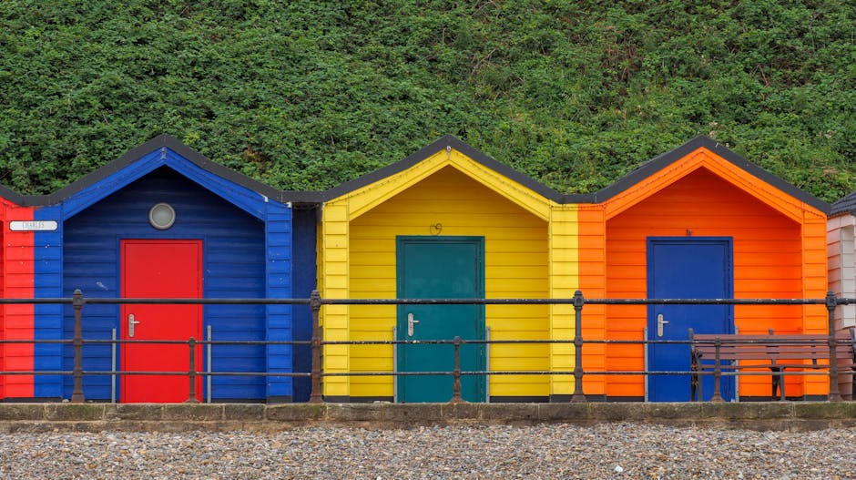 Vibrant beach huts along the shore in Saltburn-by-the-Sea, England.